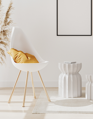 Styled interior with a white chair and side table
